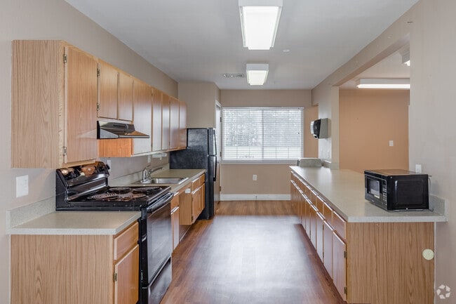 Community Room Kitchen - River Run Senior Apartments