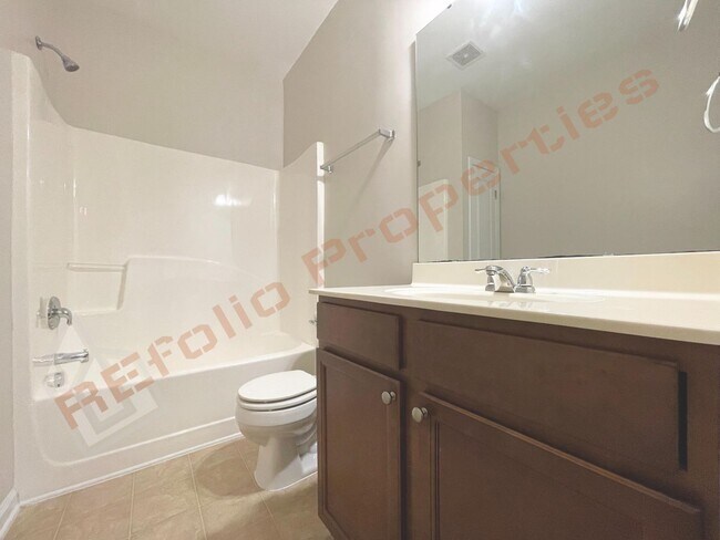 Building Photo - No Carpet! Beautiful 3-Story Townhome with...