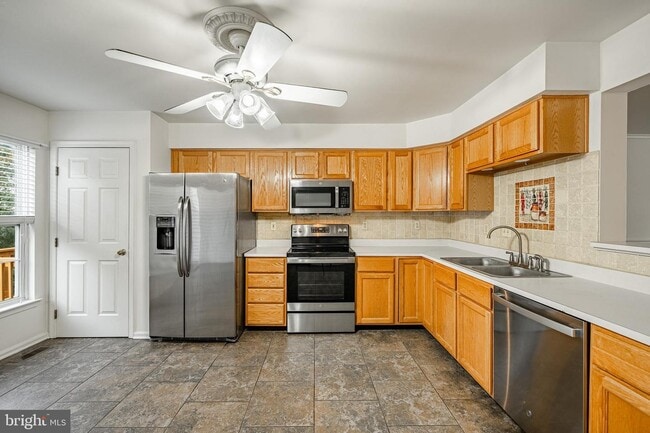 Photo - 596 Coach Hill Ct Townhome