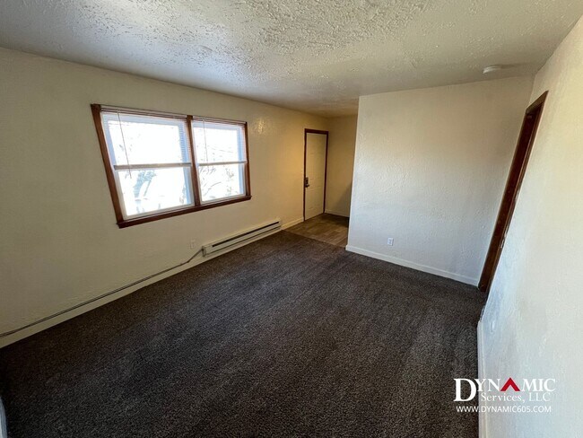 Building Photo - Upper Level 1 Bedroom, 1 Bathroom Apartment - Tenant Pays Electric Only