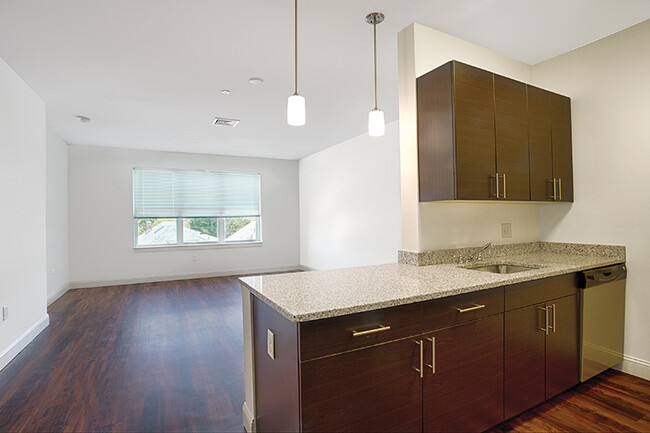 Spacious bathroom with granite countertops - Charlesbank Apartment Homes