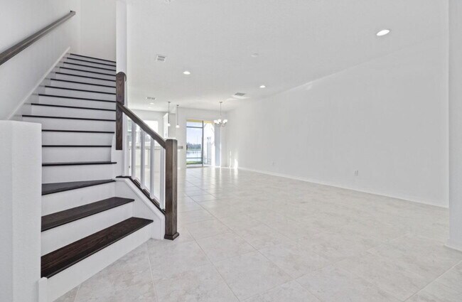 Foto del edificio - "Charming 3-Bedroom Retreat with Lake View & Pool on Southwell Lane, Wesley Chapel!"