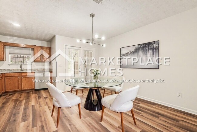 Foto del edificio - 6334 Wellington Walk Way