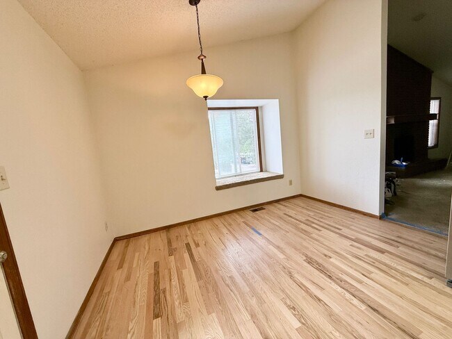 Building Photo - Beautifully Updated 5 Bedroom Rockrimmon Ranch Home Backing to Open Space