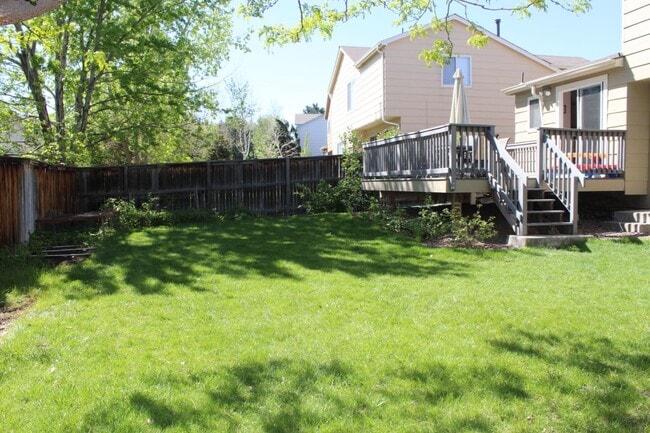 Spacious back yard with trex deck. - 2167 Gold Dust Lane