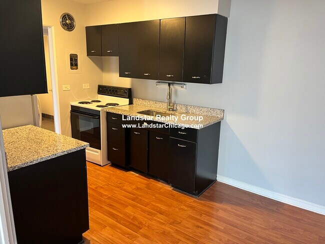 Foto del edificio - 6014 N Kenmore Ave