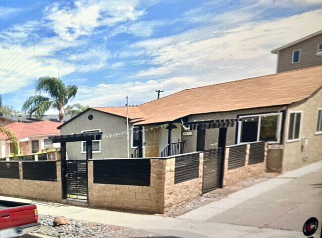 Exterior has a new black roof - 1813 Oliver Ave