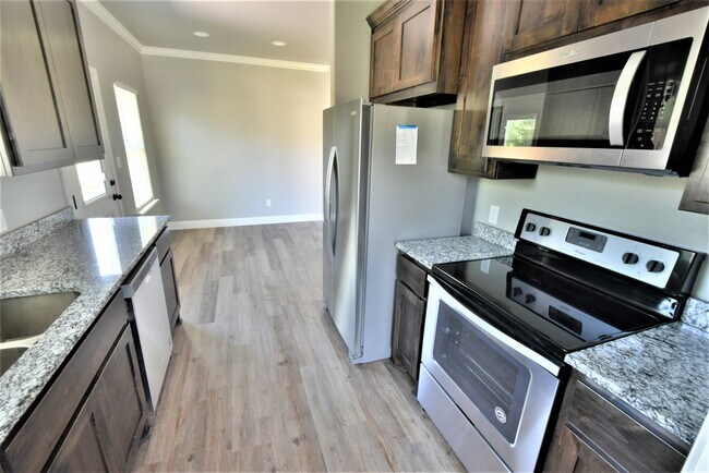 Kitchen looking towards Dining Area - 3613 Mandy Dr