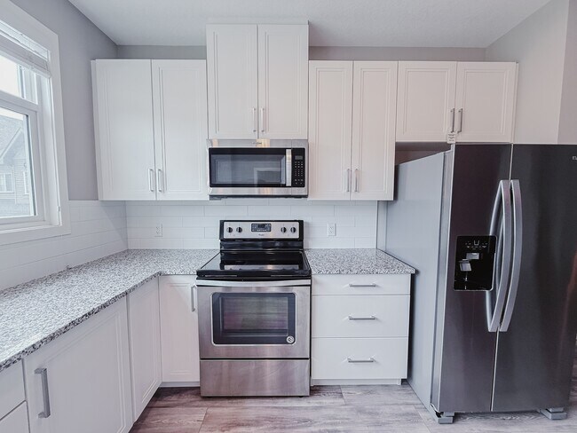 Building Photo - 129 Copperstone Park SE