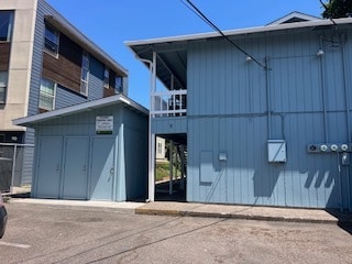 back view where parking is located + bicycle rooms - 1948 Harris St