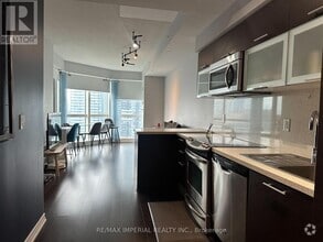 Building Photo - 386-3386 Yonge St