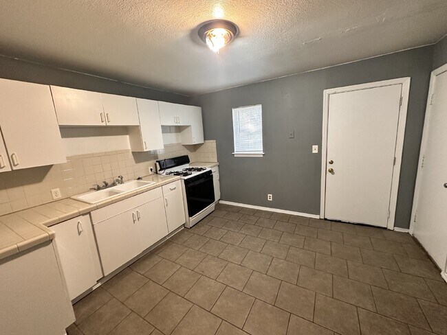 Building Photo - "Charming 2-Bedroom North Tulsa Home with ...