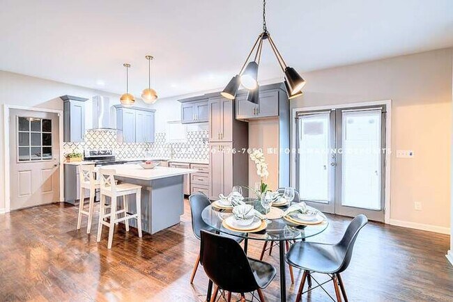 Building Photo - MASSIVE MODERN 4 BR W/ 2 MASTERS & OPEN FL...