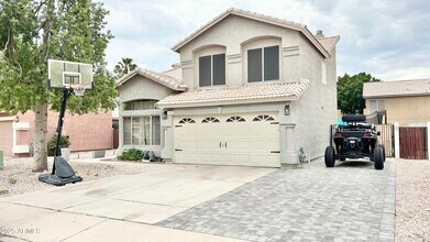 Building Photo - 7407 E Medina Ave