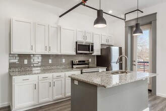 Building Photo - The Residences at 218 E Main St