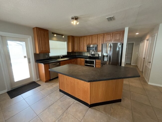 Building Photo - 8155 Bluestar Cir