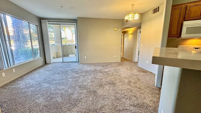 Building Photo - Modern 2 Bed Condo in Prime Southwest Vegas
