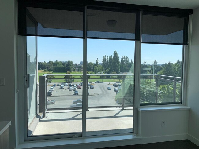 Building Photo - 503-8800 Hazelbridge Way