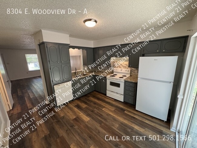 Building Photo - 8304 Woodview Dr N