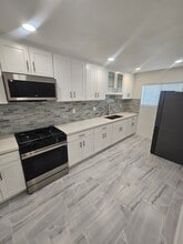 Building Photo - 15302 Bellflower Blvd