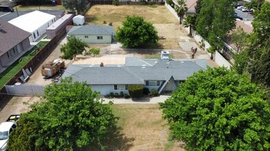 Building Photo - 7421 N Maple Ave