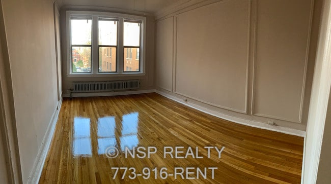 Building Photo - 1373 W Estes Ave