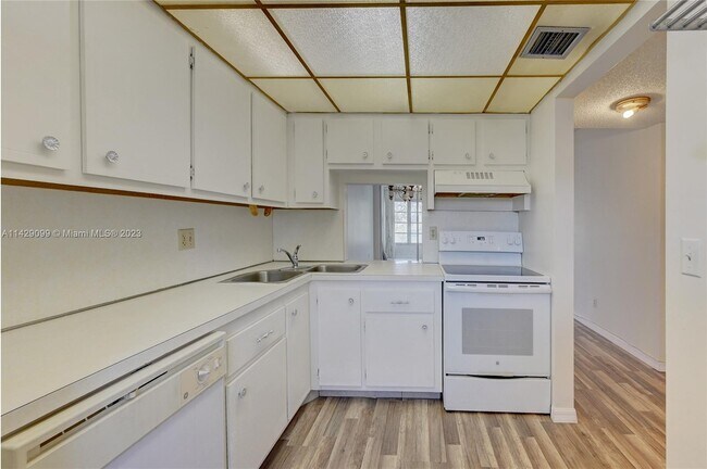 Building Photo - 5890 NW 64th Ave