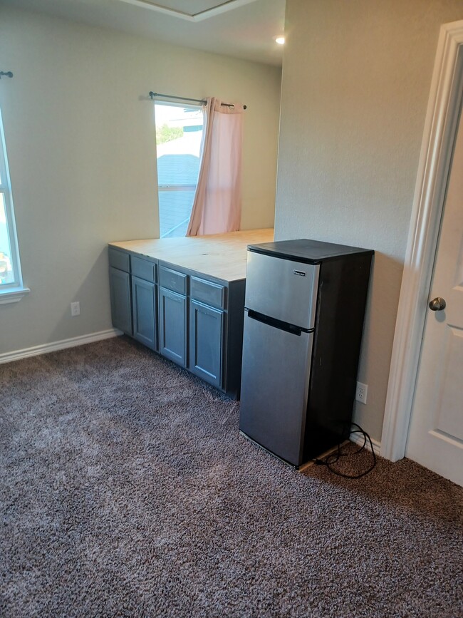 We built some old cabinets into the bedframe - 178 Moss Valley Dr