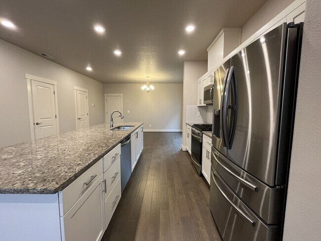 Building Photo - Well-Designed Home with Big Kitchen Island & Upstairs Loft