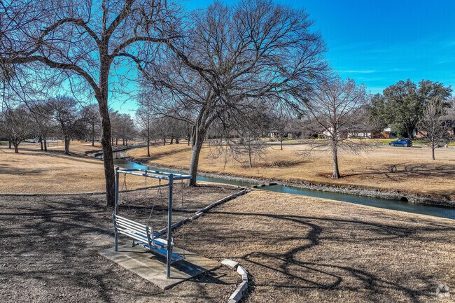 Rawhide Trail Park in Farmers Branch has benches along the paths for you to rest and relax.