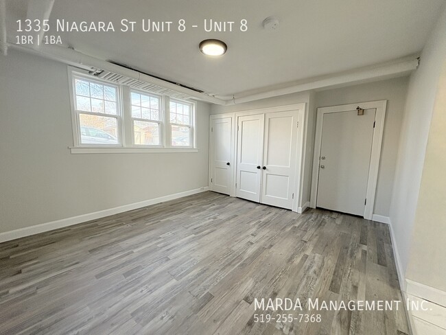 Building Photo - BRIGHT & COZY 1-BEDROOM/1-BATH UNIT IN WAL...