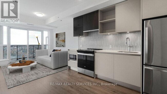 Photo du bâtiment - 405-405 Dundas St W