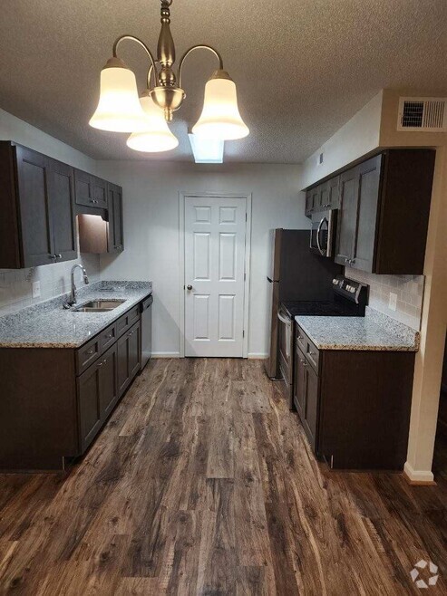 Kitchen and Laundry room - Cambridge Apartments of Florence