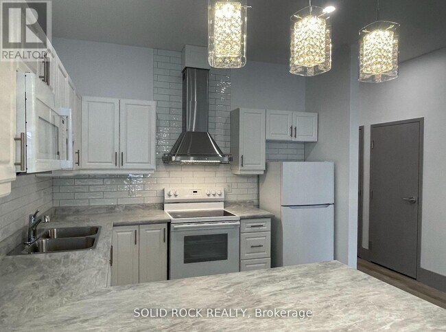 Photo du bâtiment - 48 King St E