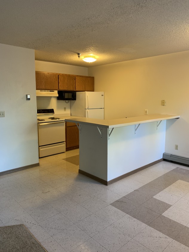 Kitchen in townhome - Cedar Trail Apartments