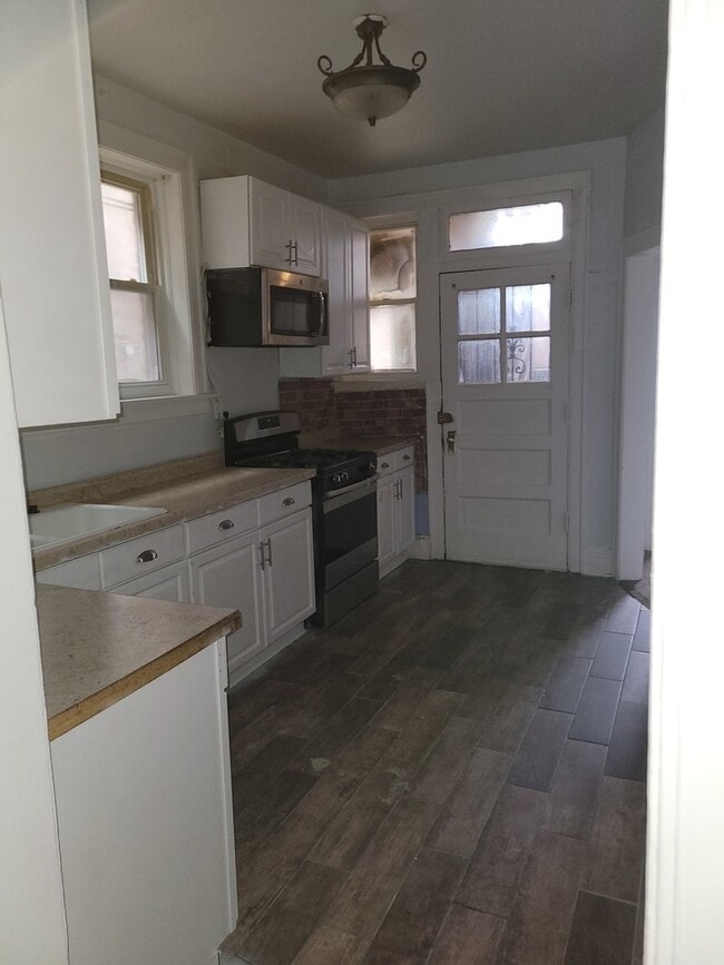 Foto del edificio - 7842 S Bennett Ave