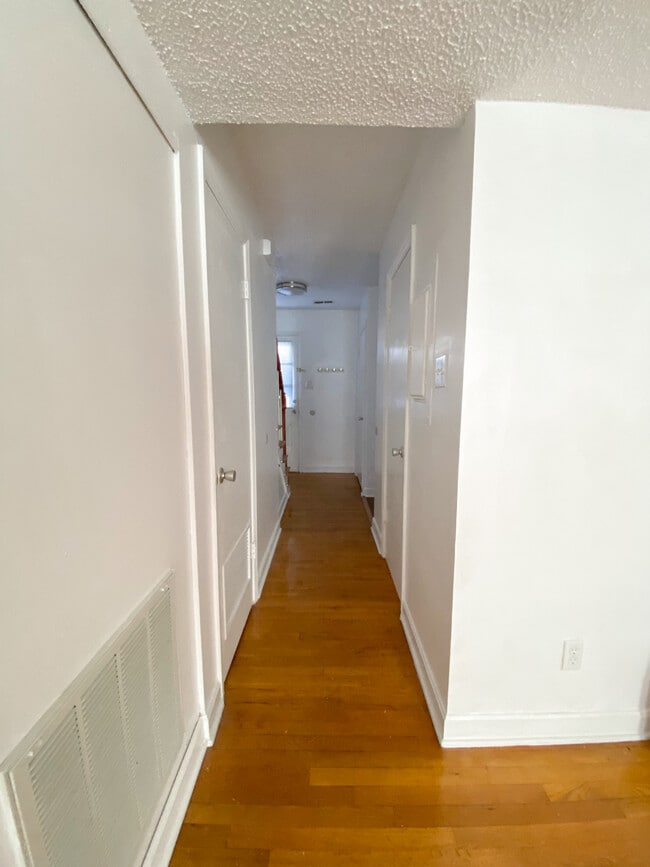 hallway looking back at front door - 506 N Greensboro St