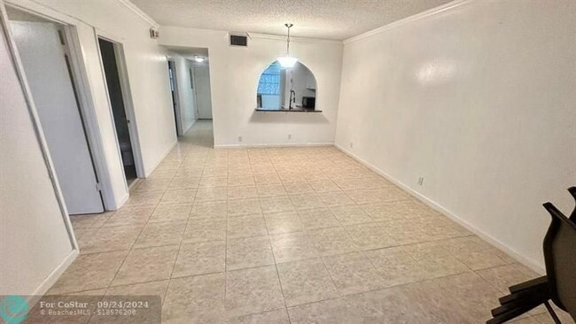 Building Photo - 2500 Coral Springs Dr