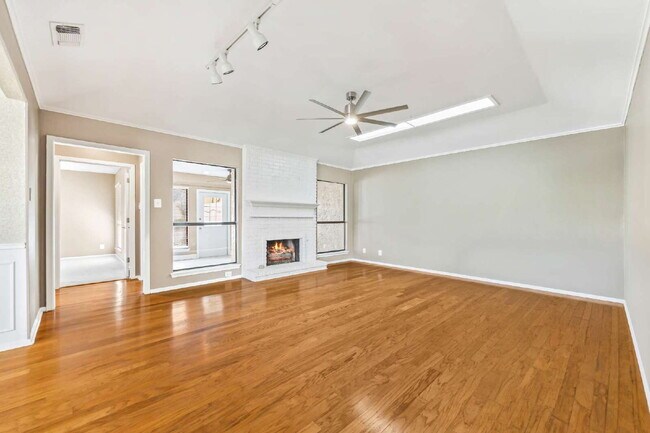 Building Photo - "Charming garden home offers 3-Bedroom Sanctuary with Cozy Fireplace in San Antonio – 1710 Sq Ft ...