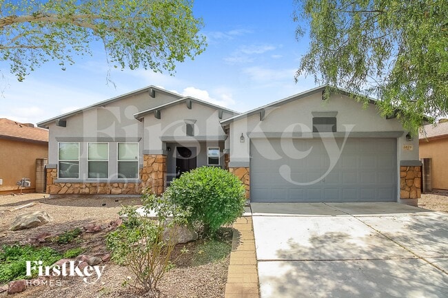 Building Photo - 5878 E Cedarbird Dr