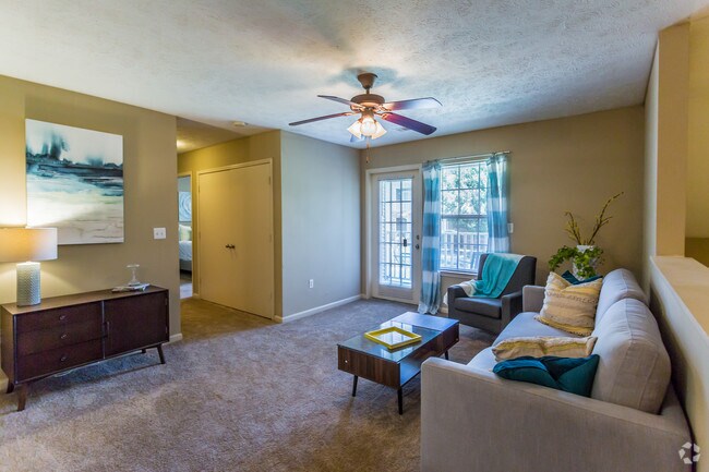 2 habitaciones, 2 baños - 1099 pies cuadrados - Sala de estar - Covington Park