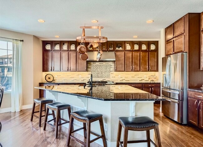 Kitchen w/large island - 15705 Red Deer Dr