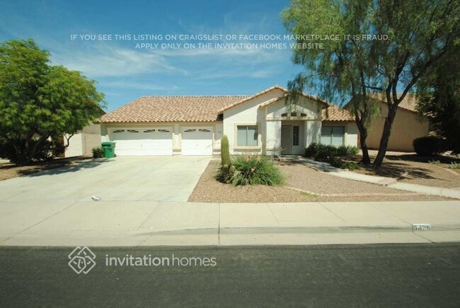 Building Photo - 9426 E Juanita Ave