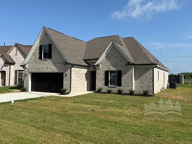 Building Photo - Welcome to this spacious 4 bedroom, 3 bath...