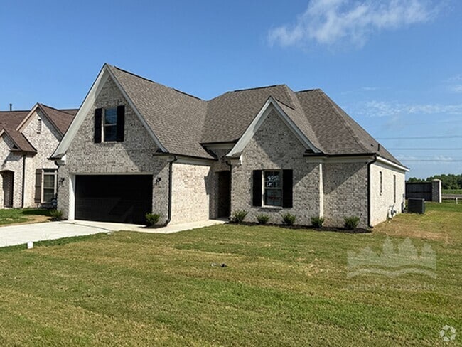 Building Photo - Welcome to this spacious 4 bedroom, 3 bath...