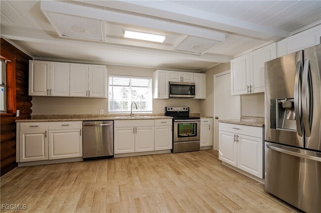 Building Photo - 1219 Thompson Ave