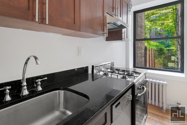 Foto del edificio - SPACIOUS ONE BEDROOM: MODERN LIVING IN PRE...