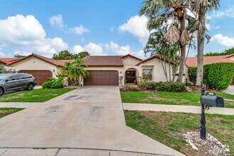 Building Photo - 7883 Villa Nova Dr N