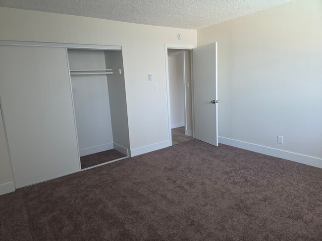 large bedroom with large closet - 5530 Ackerfield Ave