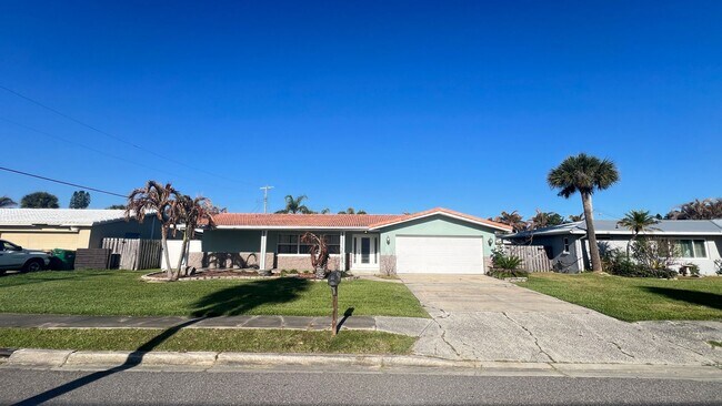 Building Photo - IMMACULATE 4 Bedroom, 2 Bathroom Home in Cocoa Beach!! ONLY MINUTES from the Beach!! (Lawn Care I...